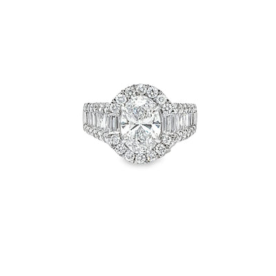 Lab Grown Oval Center Diamond set in a Natural Mined Diamond Halo and Tapered Baguette Engagement Ring
