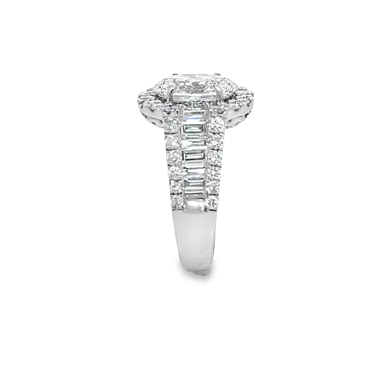 Lab Grown Oval Center Diamond set in a Natural Mined Diamond Halo and Tapered Baguette Engagement Ring