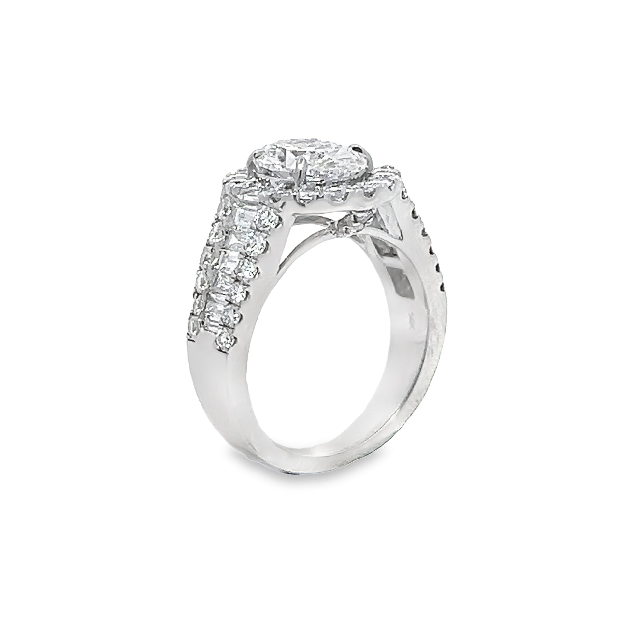 Lab Grown Oval Center Diamond set in a Natural Mined Diamond Halo and Tapered Baguette Engagement Ring